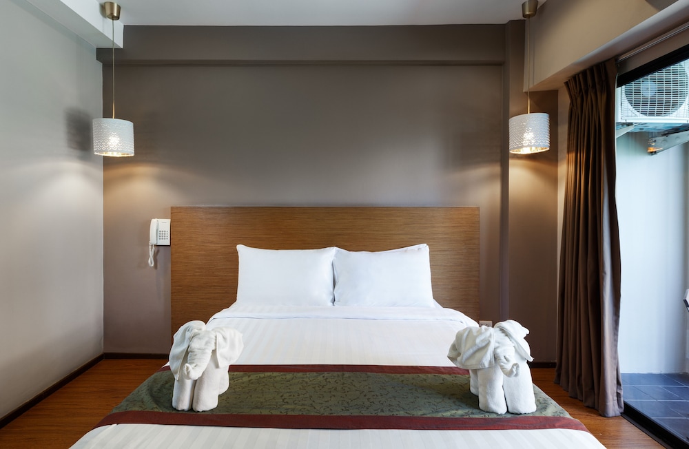 Superior With Two Ways Airport Transfer del hotel The Cottage Suvarnabhumi. Foto 3