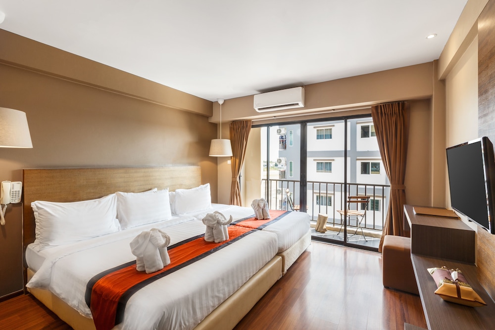 Superior Triple Room With Two Ways Airport Transfer del hotel The Cottage Suvarnabhumi