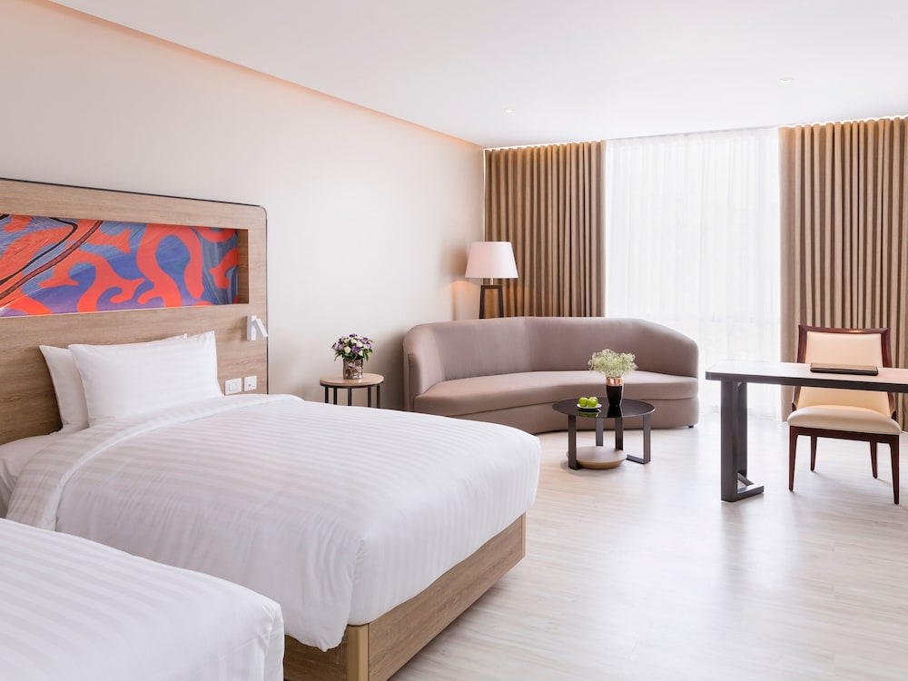 Habitación Ejecutiva con Dos Camas Individuales del hotel Novotel Phuket City Phokeethra - Sha Extra Plus. Foto 1