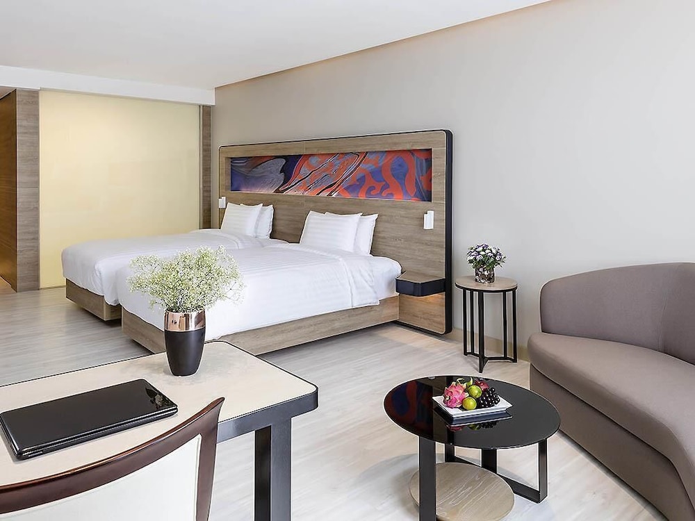 Habitación Ejecutiva con Dos Camas Individuales del hotel Novotel Phuket City Phokeethra - Sha Extra Plus. Foto 7