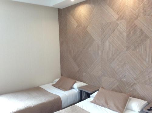Habitación Doble - 2 camas del hotel Ciudad De Fuenlabrada. Foto 8