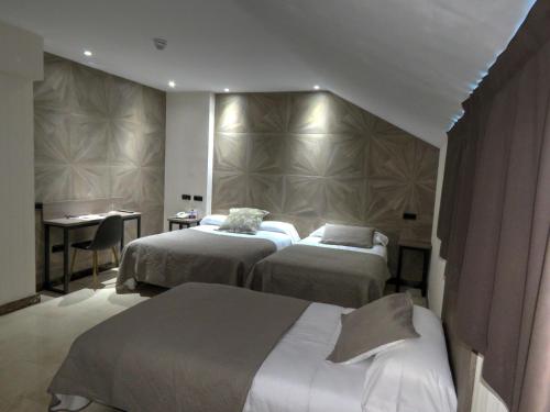 Habitación Triple del hotel Ciudad De Fuenlabrada. Foto 9