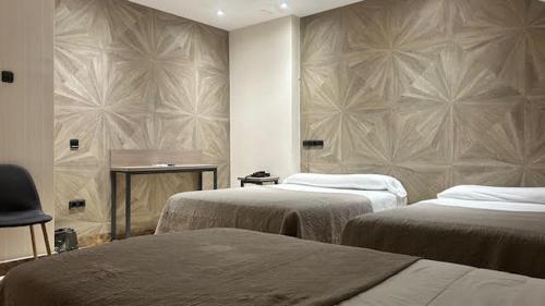 Habitación Triple del hotel Ciudad De Fuenlabrada. Foto 17