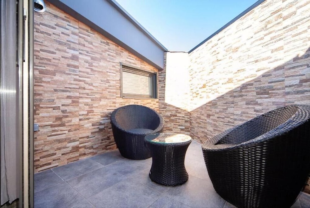 JUNIOR SUITE TERRACE del hotel Sant Pere Ii. Foto 3