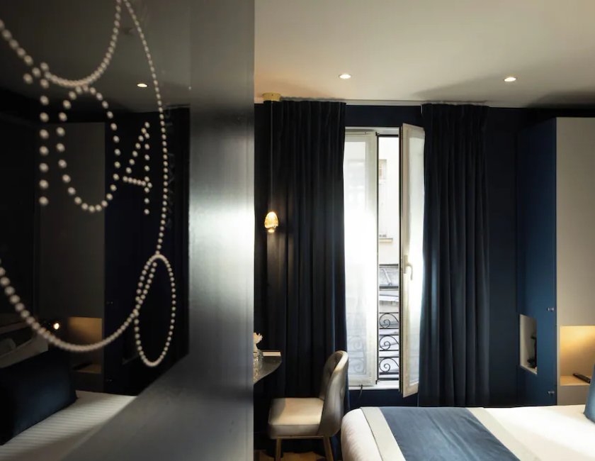 Habitación Clásica del hotel Les Bulles de Paris. Foto 7