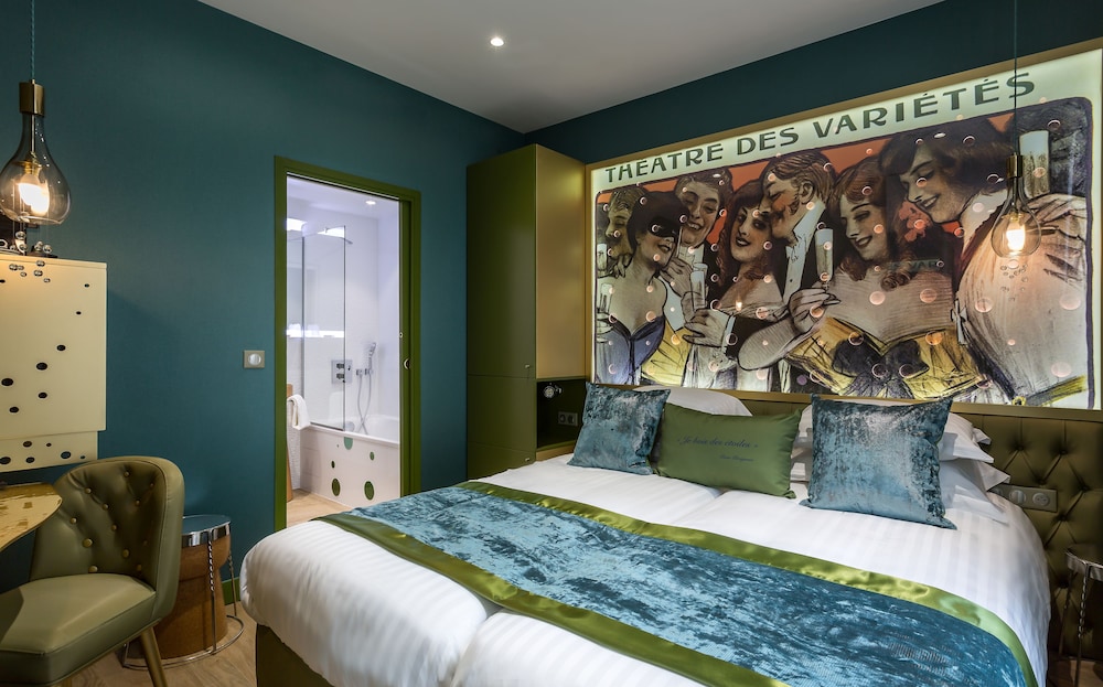 Habitación triple Deluxe del hotel Les Bulles de Paris. Foto 3