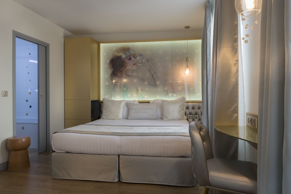 Habitación triple Deluxe del hotel Les Bulles de Paris. Foto 4