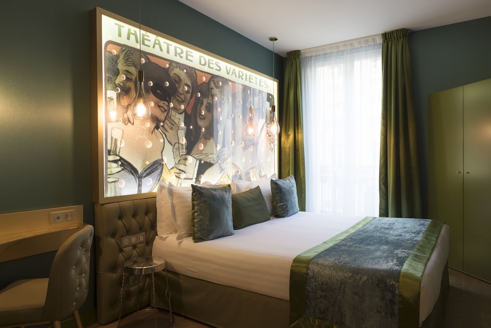 Habitación triple Deluxe del hotel Les Bulles de Paris. Foto 6