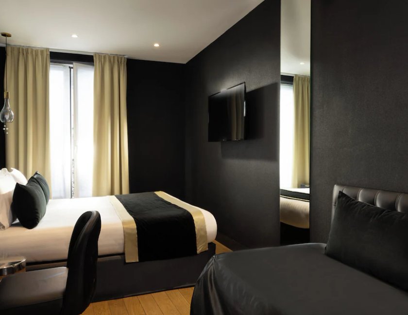 Habitación Triple Deluxe del hotel Les Bulles de Paris. Foto 16