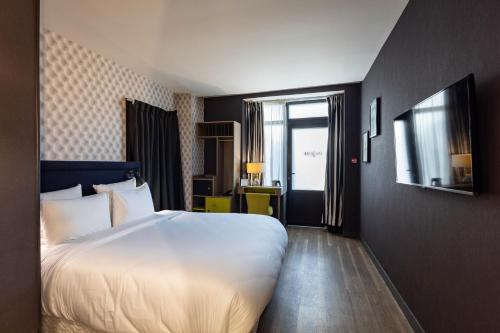 Habitación Doble - Adaptada para personas de movilidad reducida - Planta Baja del hotel La Parizienne By Elegancia. Foto 1