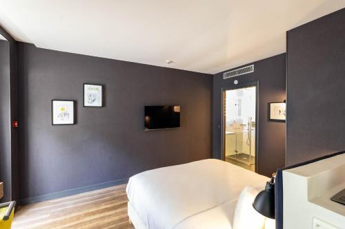Habitación Doble - Adaptada para personas de movilidad reducida - Planta Baja del hotel La Parizienne By Elegancia. Foto 2