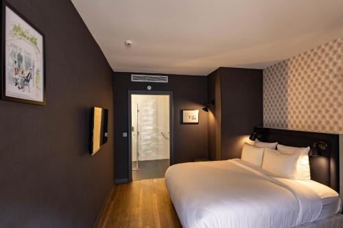 Habitación Doble - Adaptada para personas de movilidad reducida - Planta Baja del hotel La Parizienne By Elegancia. Foto 3