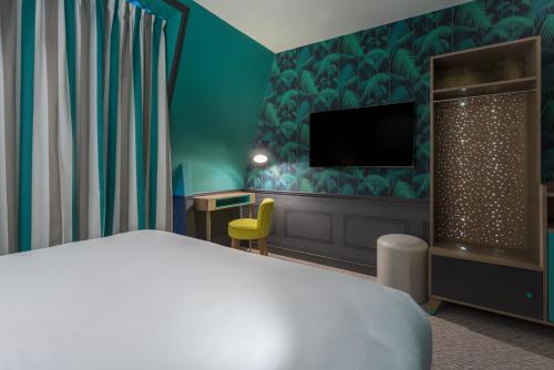 Habitación Doble Deluxe del hotel La Parizienne By Elegancia. Foto 6