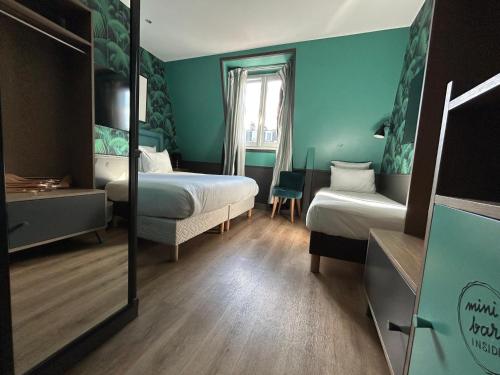 Habitación Triple del hotel La Parizienne By Elegancia. Foto 3