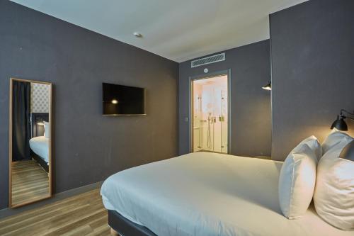 Habitación Doble - Adaptada para personas de movilidad reducida - Planta Baja del hotel La Parizienne By Elegancia. Foto 6