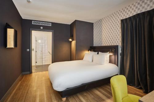Habitación Doble - Adaptada para personas de movilidad reducida - Planta Baja del hotel La Parizienne By Elegancia. Foto 8