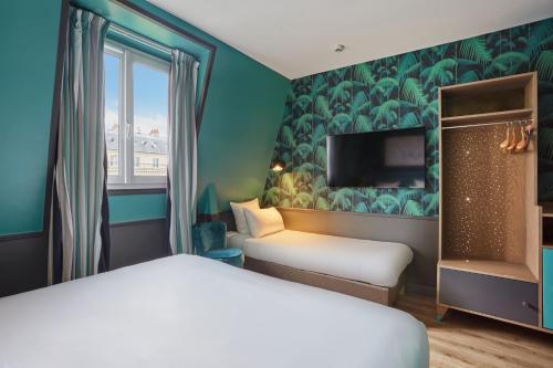 Habitación Triple del hotel La Parizienne By Elegancia. Foto 5