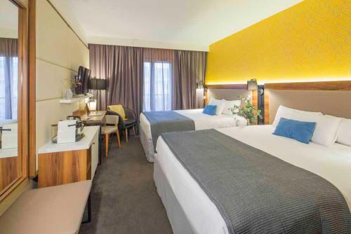 Habitación Cuádruple Prémium del hotel L'Elysee Val D'Europe. Foto 5