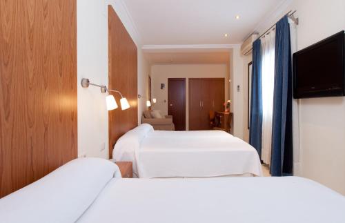 Habitación Cuádruple Confort del hotel Mr Costa Blanca. Foto 1