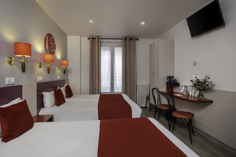 Habitación cuádruple familiar del hotel Grand De Turin. Foto 3