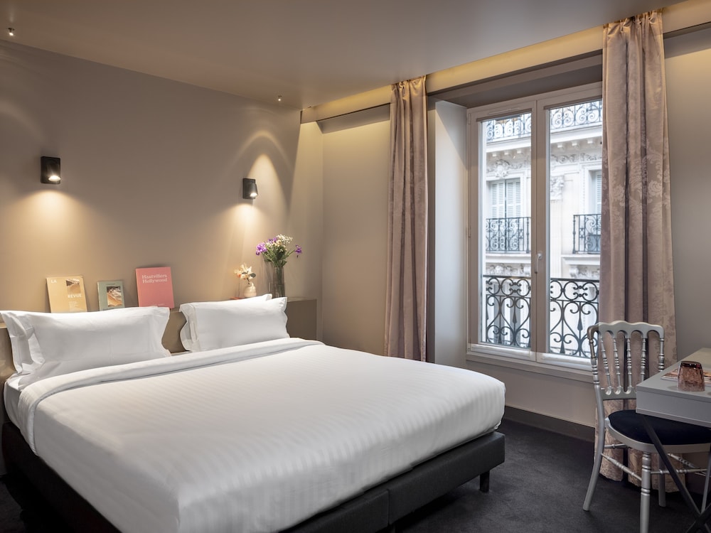 Habitación Triple Deluxe del hotel Grand Hotel Lafayette. Foto 1