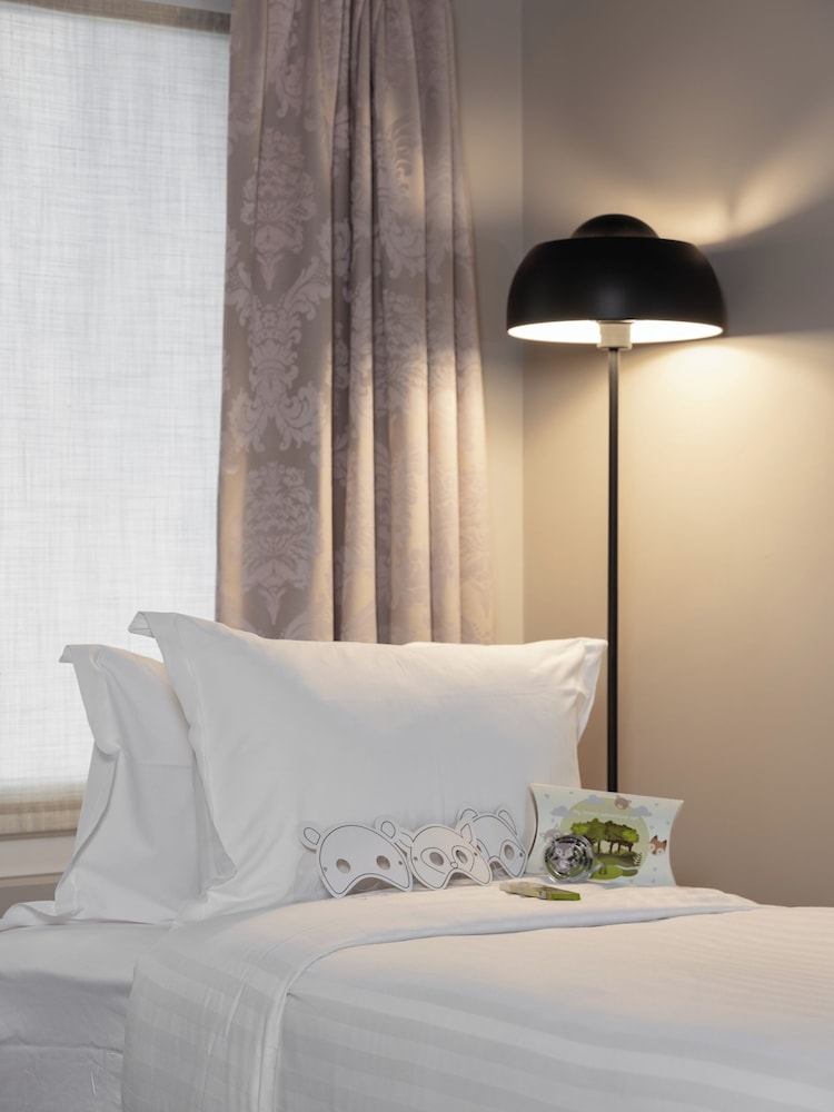 Habitación Cuádruple Deluxe del hotel Grand Hotel Lafayette. Foto 1