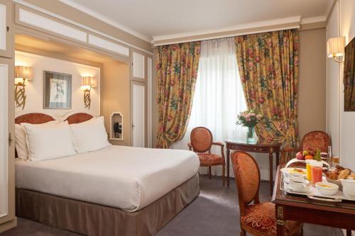 Habitación Clásica del hotel Majestic Spa Paris. Foto 4