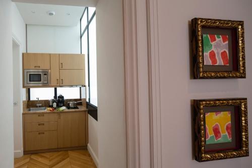 Habitación Deluxe Grande del hotel Majestic Spa Paris. Foto 3