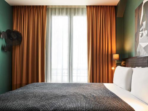Habitación Doble Clásica del hotel Mercure Paris Tour Eiffel Pont Mirabeau. Foto 16