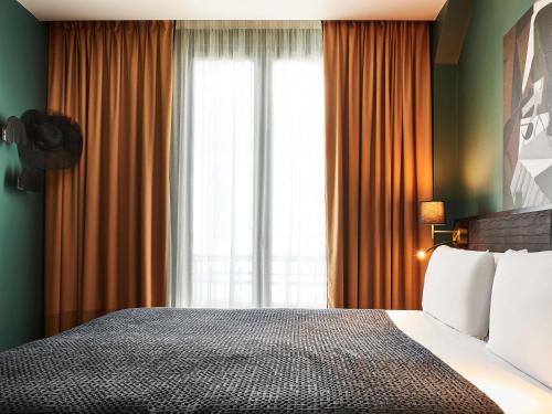 Habitación Doble Clásica del hotel Mercure Paris Tour Eiffel Pont Mirabeau. Foto 18
