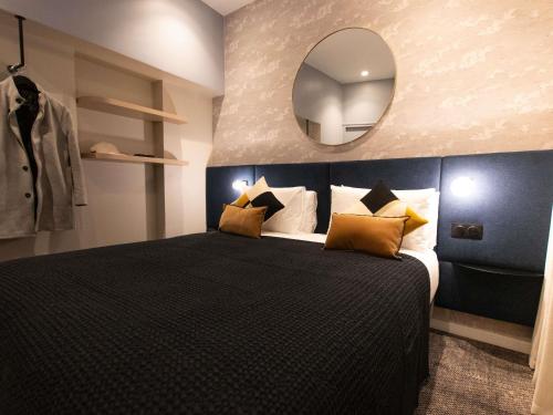 Apartamento Superior con 1 cama doble y sofá del hotel Mercure Paris Tour Eiffel Pont Mirabeau. Foto 4