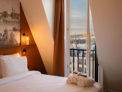 Habitación Privilege con cama extragrande del hotel Mercure Paris Bastille Marais. Foto 2