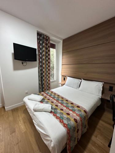 Habitación Deluxe del hotel Paris Bruxelles. Foto 1