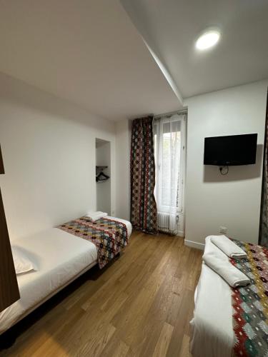 Habitación Triple Deluxe del hotel Paris Bruxelles