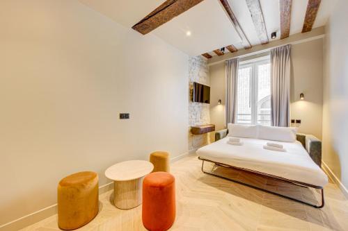 Estudio con sofá cama del hotel Marie. Foto 1