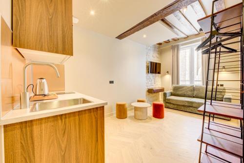 Estudio con sofá cama del hotel Marie. Foto 5