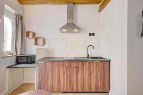 Estudio con sofá cama del hotel Marie. Foto 9