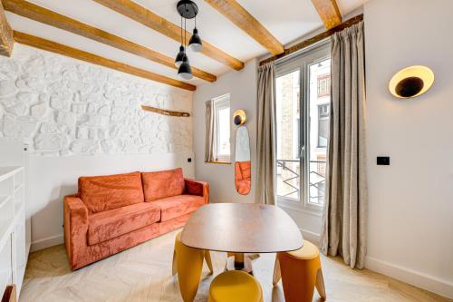 Estudio con sofá cama del hotel Marie. Foto 11