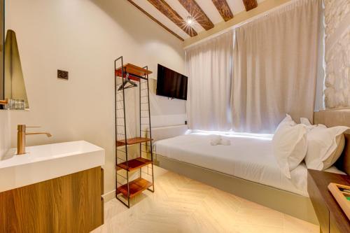 Habitación individual con aseo compartido del hotel Marie. Foto 2