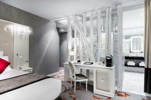 Suite Diamond - Cama extragrande del hotel Maison Albar Hotels Le Diamond. Foto 3