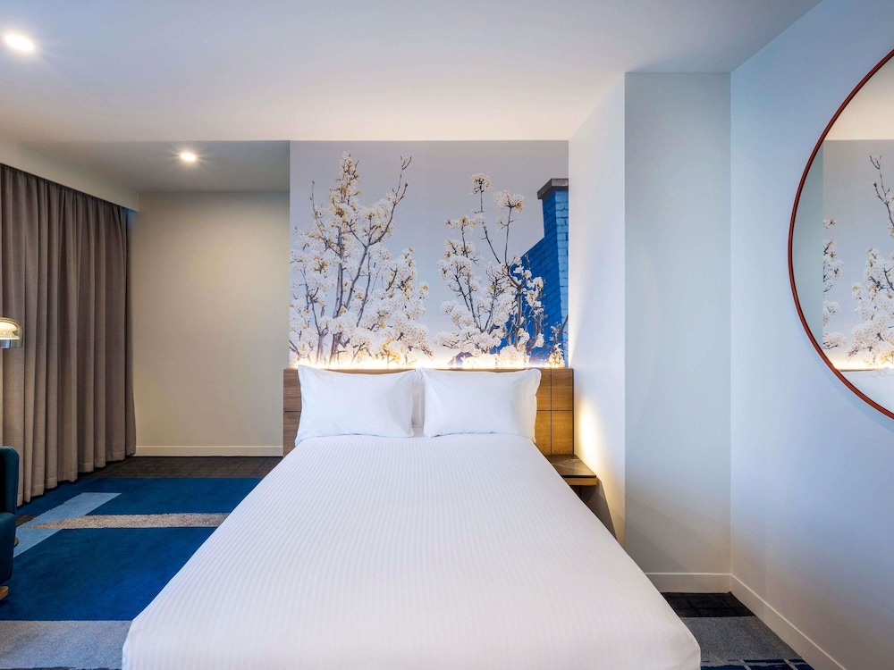 Habitación Superior con 1 Cama Queen del hotel Novotel Melbourne Preston. Foto 1