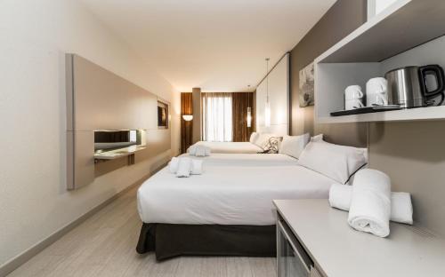 Habitación Cuádruple del hotel Grums and Spa