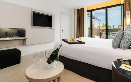 Habitación Ático con terraza y 1 acceso al spa por persona y estancia del hotel Grums and Spa. Foto 1