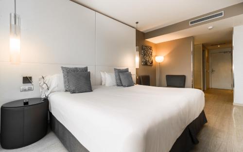 Habitación Ático con terraza y 1 acceso al spa por persona y estancia del hotel Grums and Spa. Foto 2