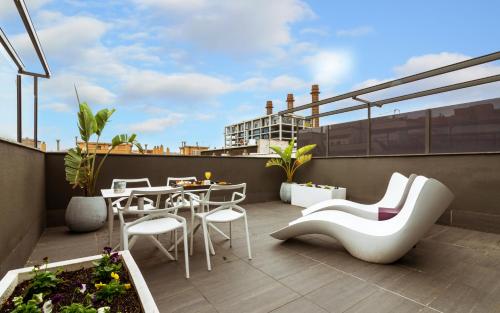 Habitación Ático con terraza y 1 acceso al spa por persona y estancia del hotel Grums and Spa. Foto 3