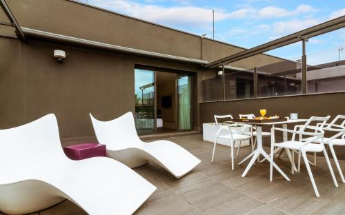 Habitación Ático con terraza y 1 acceso al spa por persona y estancia del hotel Grums and Spa. Foto 4