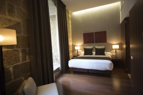 Habitación Doble Básica - 1 o 2 camas del hotel Carris Ribeira. Foto 6