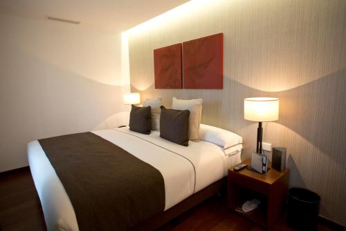 Suite Deluxe con terraza y vistas al río del hotel Carris Ribeira. Foto 6