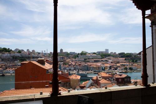Suite Deluxe con terraza y vistas al río del hotel Carris Ribeira. Foto 11