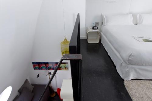 Habitación Triple Dúplex del hotel Gat Rossio. Foto 3